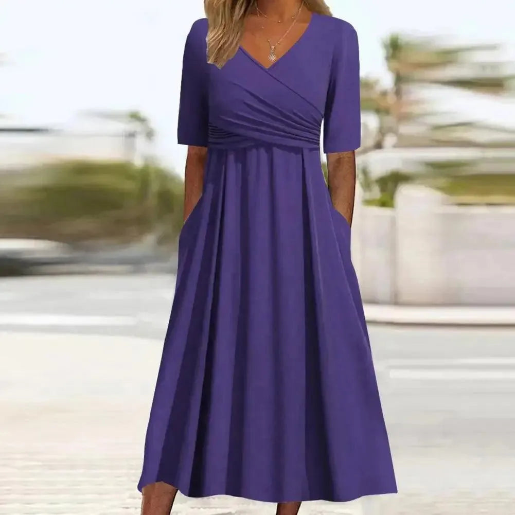 Eva - Stilfuld midikjole til enhver lejlighed