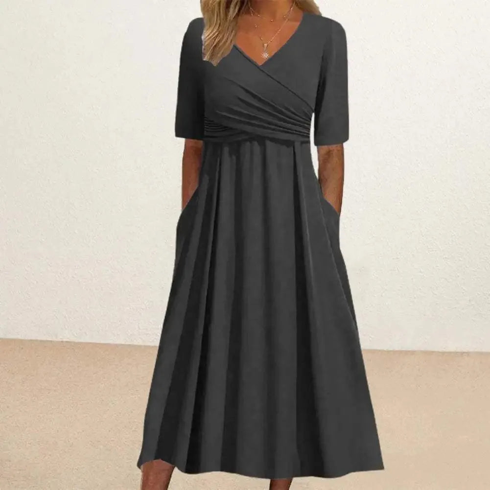 Eva - Stilfuld midikjole til enhver lejlighed